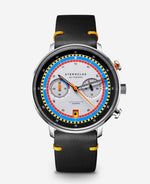 popup|Inspired by regatta chronographs of the 1970s..|..the primary Bauhaus colours of red, yellow and blue meet the colour scheme of sailing boat racing. A special detail awaits sailing fans in the date window: every two days, the colourful signal symbols of the regatta appear instead of the numbers.