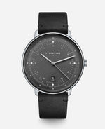 popup|Curved dial|The graphite satin-finished dial with fine curvature gives the model a noble vintage character.