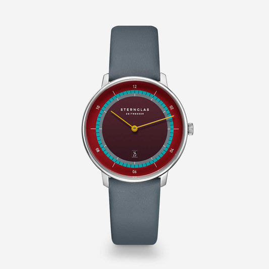 popup|Subtle colourfulness|The dial with elegant satin finish is colour-coordinated with the fine leather strap. A decorative highlight for your wrist without being too overloaded.