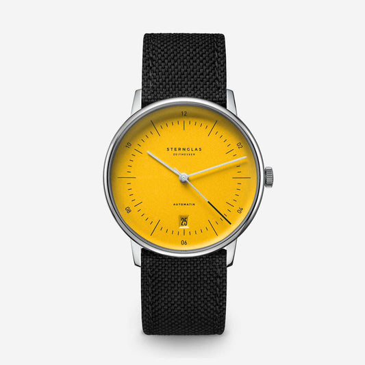 popup|Classical Bauhaus design|Inspired by the Bauhaus movement of the 1920s, the dial is reduced and clear. "Form follows function.